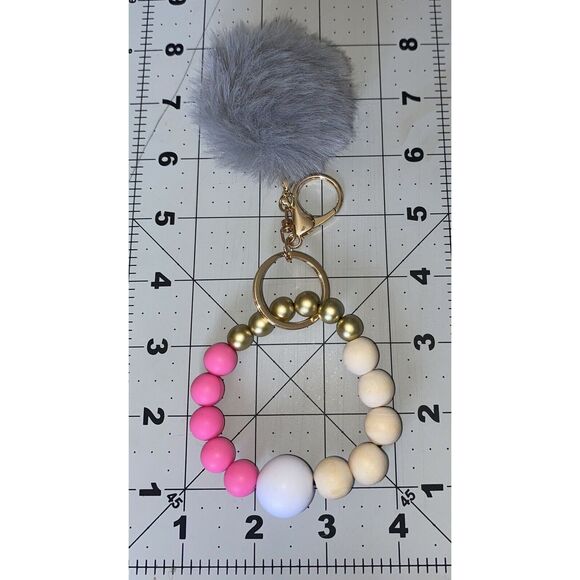 🎀2/$20🎀 Pink and Gold Wristlet Keychain with Pom Pom - Picture 4 of 5